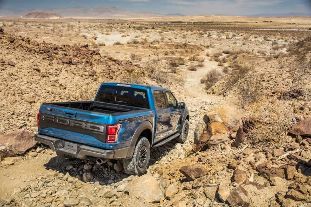 short bed pickup truck driving offroad