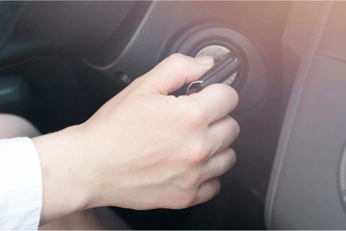 Close-up for hand turning car key