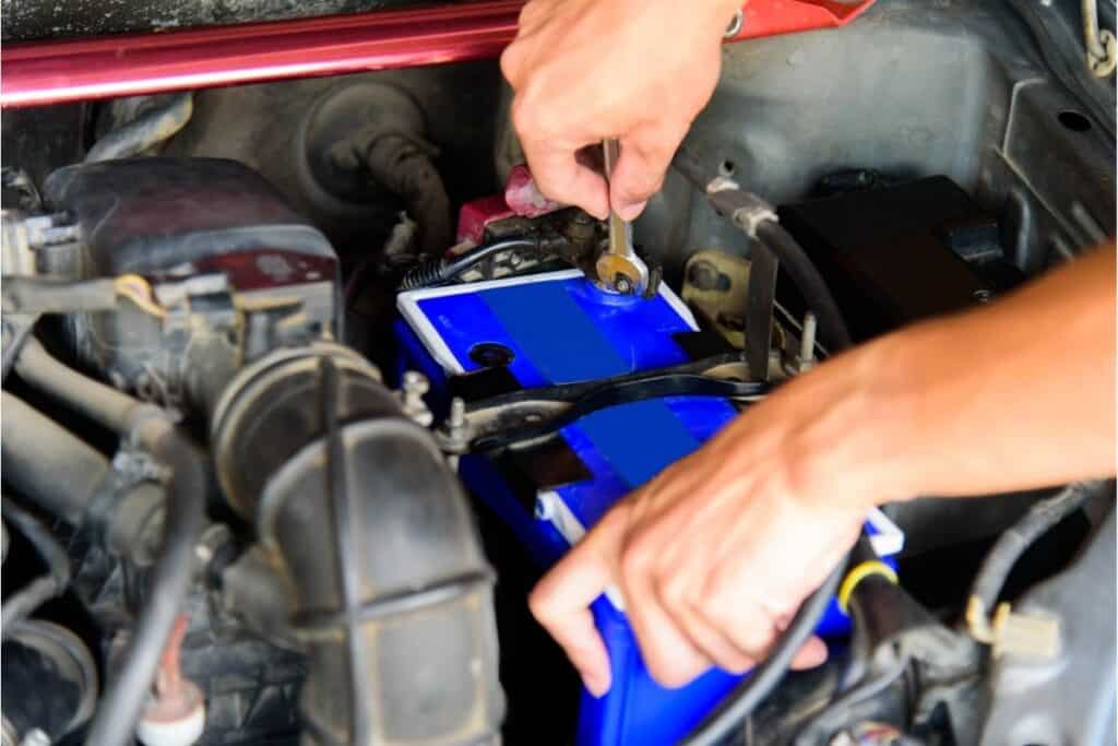 can i charge a car battery without disconnecting it