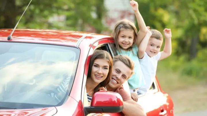 family riding in car