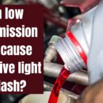 Can low transmission fluid cause overdrive light to flash